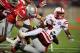COLUMBUS, OH - OCTOBER 6: Braylon Heard #5 of the Nebraska Cornhuskers is gang tackled by a group of Ohio State Buckeyes defenders at Ohio Stadium on October 6, 2012 in Columbus, Ohio. Ohio State defeated Nebraska 63-38. (Photo by Jamie Sabau/Getty Images)