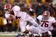 COLUMBIA, MO - OCTOBER 13: Running back Spencer Duncan #40 of the Alabama Crimson Tide carries the ball upfield as offensive linesman D.J. Fluker #76 watches during the game against the Missouri Tigers at Faurot Field/Memorial Stadium on October 13, 2012 in Columbia, Missouri. (Photo by Jamie Squire/Getty Images)