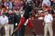 LANDOVER, MD - SEPTEMBER 29: Quarterback Munchie Legaux #4 of the Cincinnati Bearcats passes against the Virginia Tech Hokies during their NCAA football game at FedExField on September 29, 2012 in Landover, Maryland. (Photo by Jonathan Ernst/Getty Images)