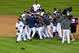 DETROIT, MI - OCTOBER 18: Phil Coke #40 (L) of the Detroit Tigers celebrates with his teammates after the Tigers won 8-1 against the New York Yankees during game four of the American League Championship Series at Comerica Park on October 18, 2012 in Detroit, Michigan. (Photo by Jason Miller/Getty Images)