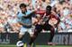 MANCHESTER, ENGLAND - OCTOBER 06: Danny Rose of Sunderland tangles with David Silva of Manchester City during the Barclays Premier League match between Manchester City and Sunderland at the Etihad Stadium on October 6, 2012 in Manchester, England. (Photo by Clive Brunskill/Getty Images)