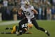 GREEN BAY, WI - SEPTEMBER 30: Jimmy Graham #80 of the New Orleans Saints moves around Charles Woodson #21 of the Green Bay Packers at Lambeau Field on September 30, 2012 in Green Bay, Wisconsin. The Packers defeated the Saints 28-27. (Photo by Jonathan Daniel/Getty Images)
