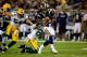 ST. LOUIS, MO - SEPTEMBER 27: Steven Jackson #39 of the St. Louis Rams carries the ball against Charles Woodson #21 and Brandon Chillar #54 of the Green Bay Packers during the game at the Edward Jones Dome on September 27, 2009 in St. Louis, Missouri. (Photo by Dilip Vishwanat/Getty Images)