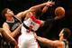 NEW YORK, NY - OCTOBER 15: Bradley Beal #3 of the Washington Wizards drives to the basket as Brook Lopez #11 of the Brooklyn Nets defends during a preseason game at the Barclays Center on October 15, 2012 in the Brooklyn borough of New York City. NOTE TO USER: User expressly acknowledges and agrees that, by downloading and/or using this photograph, user is consenting to the terms and conditions of the Getty Images License Agreement. (Photo by Alex Trautwig/Getty Images)