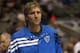 DALLAS, TX - OCTOBER 17: Dirk Nowitzki #41 of the Dallas Mavericks stands on the bench during a preseason game at American Airlines Center on October 17, 2012 in Dallas, Texas. NOTE TO USER: User expressly acknowledges and agrees that, by downloading and or using this photograph, User is consenting to the terms and conditions of the Getty Images License Agreement. (Photo by Ronald Martinez/Getty Images)