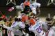 NASHVILLE, TN - OCTOBER 13: Wesley Tate #24 of the Vanderbilt Commodores is gang tackled by Leon Orr #44, Josh Evans #9, and De'Ante Saunders #26 of the Florida Gators at Vanderbilt Stadium on October 13, 2012 in Nashville, Tennessee. (Photo by Frederick Breedon/Getty Images)