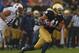 SOUTH BEND, IN - OCTOBER 13: Matthias Farley #41 of the Notre Dame Fighting Irish breaks away from Levine Toilolo#11 of the Standford Cardinal after intercepting a pass at Notre Dame Stadium on October 13, 2012 in South Bend, Indiana. Notre Dame defeated Stanford 20-13 in overtime. (Photo by Jonathan Daniel/Getty Images)