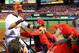 ST LOUIS, MO - OCTOBER 18: Yadier Molina #4 of the St. Louis Cardinals is congratulated after scoring in the seventh inning against the San Francisco Giants in Game Four of the National League Championship Series at Busch Stadium on October 18, 2012 in St Louis, Missouri. (Photo by Dilip Vishwanat/Getty Images)