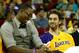 FRESNO, CA - OCTOBER 07: Pau Gasol #16 and Dwight Howard of the Los Angeles Lakers laugh in the bench in the game with the Golden State Warriors at Save Mart Center At Fresno State on October 7, 2012 in Fresno, California. NOTE TO USER: User expressly acknowledges and agrees that, by downloading and or using this photograph, User is consenting to the terms and conditions of the Getty Images License Agreement. (Photo by Stephen Dunn/Getty Images)