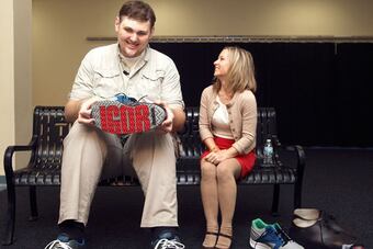 Igot-vovkovinskiy-smiles-as-he-shows-off-his-custom-made-reeboks-to-a-wcco-reporter