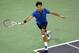 SHANGHAI, CHINA - OCTOBER 13: Roger Federer of Switzerland lunges for a ball while playing Andy Murray of Great Britain during the Men's Singles semi-finals of the Shanghai Rolex Masters at the Qi Zhong Tennis Center on October 13, 2012 in Shanghai, China. (Photo by Lintao Zhang/Getty Images)