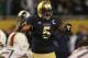 CHICAGO, IL - OCTOBER 06: Manti Te'o #5 of the Notre Dame Fighting Irish calls defensive signals against the Miami Hurricanes at Soldier Field on October 6, 2012 in Chicago, Illinois. Notre Dame defeated Miami 41-3. (Photo by Jonathan Daniel/Getty Images)