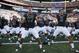 Sept 22, 2012; Honolulu, HI, USA; Hawaii Warriors linebackers Kamalani Alo (47) and T.J. Taimatuia (3) lead the Hawaii football team in a