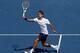 MASON, OH - AUGUST 19: Roger Federer of Switzerland hits a volley against Novak Djokovic of Serbia during the final on day nine of the Western & Southern Open at Lindner Family Tennis Center on August 19, 2012 in Mason, Ohio. (Photo by Nick Laham/Getty Images)