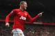 MANCHESTER, ENGLAND - OCTOBER 20: Wayne Rooney of Manchester United celebrates scoring to make it 1-1 during the Barclays Premier League match between Manchester United and Stoke City at Old Trafford on October 20, 2012 in Manchester, England. (Photo by Michael Regan/Getty Images)