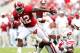 TUSCALOOSA, AL - SEPTEMBER 08: Eddie Lacy #42 of the Alabama Crimson Tide tries to break a tackle by Andrew Jackson #4 of the Western Kentucky Hilltoppers at Bryant-Denny Stadium on September 8, 2012 in Tuscaloosa, Alabama. (Photo by Kevin C. Cox/Getty Images)