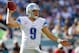 PHILADELPHIA, PA - OCTOBER 14: Quarterback Matthew Stafford #9 of the Detroit Lions looks to make a pass against the Philadelphia Eagles during the first half in a game at Lincoln Financial Field on October 14, 2012 in Philadelphia, Pennsylvania. The Lions defeated the Eagles 26-23 in overtime. (Photo by Rich Schultz /Getty Images)