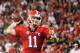September 22, 2012; Athens, GA, USA; Georgia Bulldogs quarterback Aaron Murray (11) rolls out on a pass play in the game against the Vanderbilt Commodores at Sanford Stadium. Georgia won 48-3. Mandatory Credit: Daniel Shirey-US PRESSWIRE