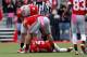 COLUMBUS, OH - OCTOBER 20: Devin Smith #15 and Jake Stoneburner #11, check on Braxton Miller #5, all of the Ohio State Buckeyes, after Miller was injured while running the ball during the fourth quarter against the Purdue Boilermakers on October 20, 2012 at Ohio Stadium in Columbus, Ohio. Miller did not return to the game.(Photo by Kirk Irwin/Getty Images)