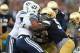 SOUTH BEND, IN - OCTOBER 20: Prince Shembo #55 of the Notre Dame Fighting Irish stops Iona Pritchard #5 of the BYU Cougars at Notre Dame Stadium on October 20, 2012 in South Bend, Indiana. Notre Dame defeated BYU 17-14. (Photo by Jonathan Daniel/Getty Images)