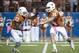 Oct 20, 2012; Austin, TX, USA; Texas Longhorns running back Daje Johnson (27) takes a handoff on the first play of the game from quarterback David Ash (14) and runs for a touchdown against the Baylor Bears during the first half at Darrell K Royal-Texas Memorial Stadium. Mandatory Credit: Brendan Maloney-US PRESSWIRE
