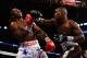 NEW YORK, NY - OCTOBER 20: Hassan N'Dam and Peter Quillin exchange punches during their WBO middleweight title fight at the Barclays Center on October 20, 2012 in the Brooklyn Borough of New York City. (Photo by Al Bello/Getty Images for Golden Boy Promotions)