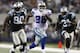 ARLINGTON, TX - SEPTEMBER 28: Felix Jones #28 of the Dallas Cowboys runs the ball 40 yards in the 3rd quarter against Richard Marshall #31 and Julius Peppers #90 of the Carolina Panthers at Cowboys Stadium on September 28, 2009 in Arlington, Texas. (Photo by Ronald Martinez/Getty Images)