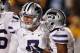 October 20, 2012; Morgantown, WV, USA; Kansas State Wildcats quarterback Collin Klein (7) and wide receiver Tyler Lockett (16) celebrate a touchdown pass against the West Virginia Mountaineers during the third quarter at Milan Puskar Stadium. The Kansas State Wildcats won 55-14. Mandatory Credit: Charles LeClaire-US PRESSWIRE