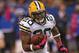 INDIANAOPLIS, IN - OCTOBER 7: Alex Green #20 of the Green Bay Packers runs against the Indianapolis Colts at Lucas Oil Stadium on October 7, 2012 in Indianapolis, Indiana. The Colts defeated the Packers 30-27. (Photo by Jonathan Daniel/Getty Images)
