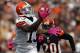 CLEVELAND, OH - OCTOBER 14: Wide receiver Josh Gordon #13 of the Cleveland Browns catches a touchdown pass in front of safety Reggie Nelson of the Cincinnati Bengals at Cleveland Browns Stadium on October 14, 2012 in Cleveland, Ohio. (Photo by Matt Sullivan/Getty Images)