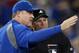 TORONTO, CANADA - OCTOBER 1: Manager John Farrell #52 of the Toronto Blue Jays argies a call in the tenth inning before being ejected by home plate umpire Marvin Hudson #51 during MLB game action against the Minnesota Twins on October 1, 2012 at Rogers Centre in Toronto, Ontario, Canada. (Photo by Tom Szczerbowski/Getty Images)