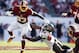 Sept. 30, 2012; Tampa FL, USA; Washington Redskins tight end Fred Davis (83) runs past Tampa Bay Buccaneers linebacker Lavonte Davis (54) during the first half at Raymond James Stadium. Mandatory Credit: Matt Stamey-US PRESSWIRE