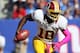 EAST RUTHERFORD, NJ - OCTOBER 21: Quarterback Robert Griffin III #10 of the Washington Redskins runs against the New York Giants during their game at MetLife Stadium on October 21, 2012 in East Rutherford, New Jersey. (Photo by Alex Trautwig/Getty Images)
