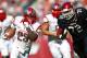 PHILADELPHIA, PA - OCTOBER 20: Running back Jawan Jamison #23 of the Rutgers Scarlet Knights out runs Hershey Walton #72 of the Temple Owls during the third quarter in a game at Lincoln Financial Field on October 20, 2012 in Philadelphia, Pennsylvania. Rutgers defeated temple 35-10. (Photo by Rich Schultz /Getty Images)