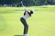 ANTALYA, TURKEY - OCTOBER 11: Tiger Woods of the USA plays his second shot into the 16th green during his match against Rory McIlroy of Northern Ireland on day three of the Turkish Airlines World Golf Final at the Antalya GC on October 11, 2012 in Antalya, Turkey. (Photo by Warren Little/Getty Images)