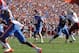 October 20, 2012; Gainesville FL, USA; Florida Gators quarterback Jeff Driskel (6) throws the ball in for a touchdown against the South Carolina Gamecocks during the first quarter at Ben Hill Griffin Stadium. Mandatory Credit: Kim Klement-US PRESSWIRE