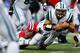 FOXBORO, MA - OCTOBER 21: Tim Tebow #15 of the New York Jets runs with the ball against the New England Patriots during the game on October 21, 2012 at Gillette Stadium in Foxboro, Massachusetts. (Photo by Jared Wickerham/Getty Images)