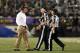 BALTIMORE, MD - SEPTEMBER 27: Head coach Pat Shurmur of the Cleveland Browns argues with back judge Bob Waggoner #25 and line judge Jeff Seeman #45 during the NFL Game against the Baltimore Ravens at M&T Bank Stadium on September 27, 2012 in Baltimore, Maryland. (Photo by Rob Carr/Getty Images)