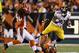 Oct 21, 2012; Cincinnati, OH, USA; Pittsburgh Steelers running back Jonathan Dwyer (27) leaps over the Cincinnati Bengals cornerback Leon Hall (29) during the first half at Paul Brown Stadium. Mandatory Credit: Frank Victores-US PRESSWIRE