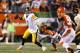 CINCINNATI, OH - OCTOBER 21: Ben Roethlisberger #7 of the Pittsburgh Steelers looks to pass the football while under pressure from Reggie Nelson #20 of the Cincinnati Bengals during the game at Paul Brown Stadium on October 21, 2012 in Cincinnati, Ohio. (Photo by Joe Robbins/Getty Images)