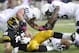 IOWA CITY, IOWA - OCTOBER 20: Tight end C.J. Fiedorowicz #86 of the Iowa Hawkeyes is brought down during the second quarter by linebackers Glen Carson #40, Gerald Hodges #6 and Michael Mauti #42 of the Penn State Nittany Lions on October 20, 2012 at Kinnick Stadium in Iowa City, Iowa. Penn State defeated Iowa 38-14. (Photo by Matthew Holst/Getty Images)