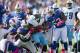 ORCHARD PARK, NY - OCTOBER 21: Darius Reynaud #25 of the Tennessee Titans struggles for yards against the Buffalo Bills at Ralph Wilson Stadium on October 21, 2012 in Orchard Park, New York.Tennessee won 35-34. (Photo by Rick Stewart/Getty Images)