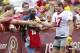 July 27, 2012; Ashburn, VA, USA; Washington Redskins tight end Chris Cooley (47) shakes hands with fans while walking to the field during Redskins training camp at Redskins Park. Mandatory Credit: Geoff Burke-US PRESSWIRE