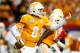 ATLANTA, GA - AUGUST 31: Tyler Bray #8 of the Tennessee Volunteers rolls out of the pocket against the North Carolina State Wolfpack at Georgia Dome on August 31, 2012 in Atlanta, Georgia. (Photo by Kevin C. Cox/Getty Images)