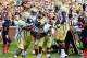 ATLANTA, GA - SEPTEMBER 15: Tevin Washington #40 of the Georgia Tech Yellow Jackets is congratulated by teammates after scoring a touchdown against the Virginia Cavaliers at Bobby Dodd Stadium on September 15, 2012 in Atlanta, Georgia. (Photo by Scott Cunningham/Getty Images)