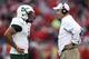 LOUISVILLE, KY - OCTOBER 20: B.J. Daniels #7 of the South Florida Bulls talks with head coach Skip Holtz during the game against the Louisville Cardinals at Papa John's Cardinal Stadium on October 20, 2012 in Louisville, Kentucky. Louisville won 27-25. (Photo by Joe Robbins/Getty Images)