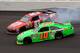 KANSAS CITY, KS - OCTOBER 21: Landon Cassill, driver of the #83 Burger King Toyota, and Danica Patrick, driver of the #10 GoDaddy.com Chevrolet, spin after an incident in the NASCAR Sprint Cup Series Hollywood Casino 400 at Kansas Speedway on October 21, 2012 in Kansas City, Kansas. (Photo by Ed Zurga/Getty Images for NASCAR)