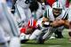 FOXBORO, MA - OCTOBER 21: Tim Tebow #15 of the New York Jets runs with the ball against the New England Patriots during the game on October 21, 2012 at Gillette Stadium in Foxboro, Massachusetts. (Photo by Jared Wickerham/Getty Images)