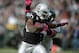 Oct 21, 2012; Oakland, CA, USA; Oakland Raiders running back Darren McFadden (20) attempts to elude Jacksonville Jaguars defensive lineman C.J. Mosley (99) at O.co Coliseum. The Raiders defeated the Jaguars in overtime 26-23. Mandatory Credit: Kirby Lee/Image of Sport-US PRESSWIRE