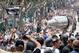 LOS ANGELES, CA - JUNE 14: Captain Dustin Brown #23 of the Los Angeles Kings holds up the Stanley Cup to the fans along the parade route during the Los Angeles Kings Stanley Cup Victory Parade on June 14, 2012 in Los Angeles, California. (Photo by Victor Decolongon/Getty Images)